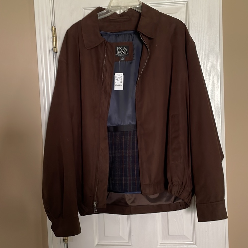 Men’s Jacket with zip out wool lining.